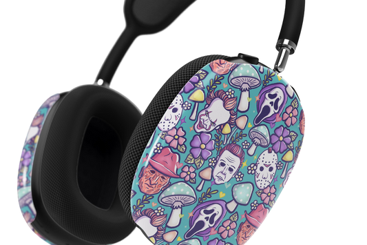 a pair of headphones with skulls and flowers on them