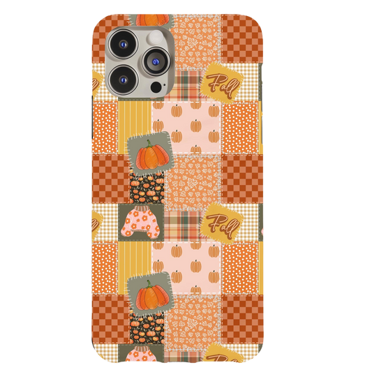 a phone case with a patchwork pattern and pumpkins