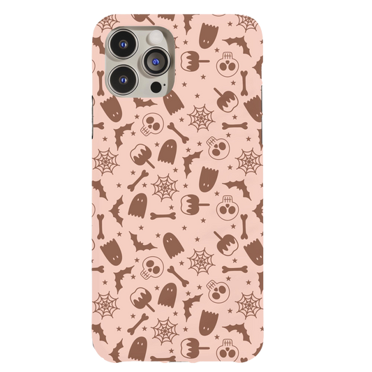 a pink phone case with skulls and stars on it