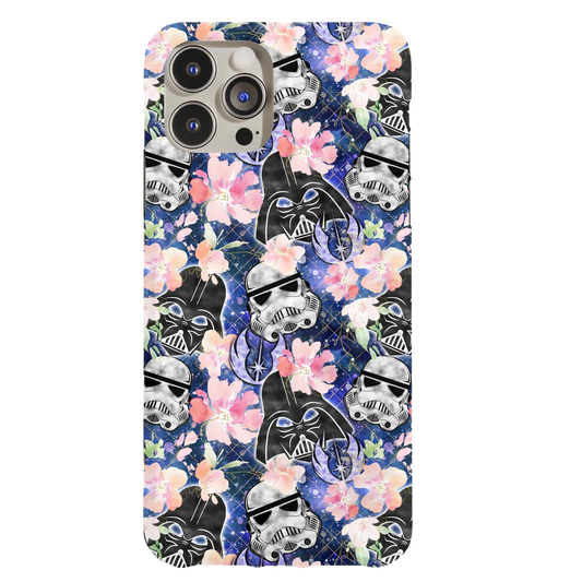 a phone case with a pattern of skulls and flowers