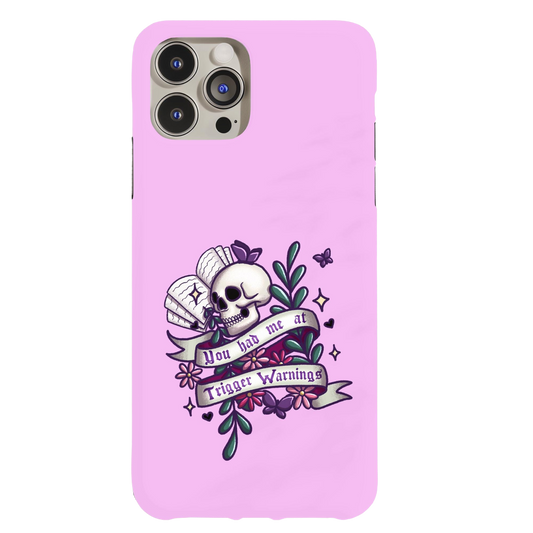 a pink phone case with a skull on it